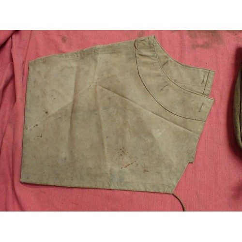 318 - WW2 German breech cover? and a canvas pack

What appears to be a breech cover, possibly for an anti-... 