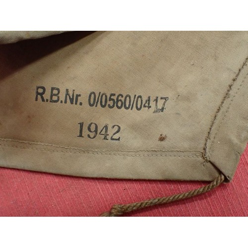 318 - WW2 German breech cover? and a canvas pack

What appears to be a breech cover, possibly for an anti-... 