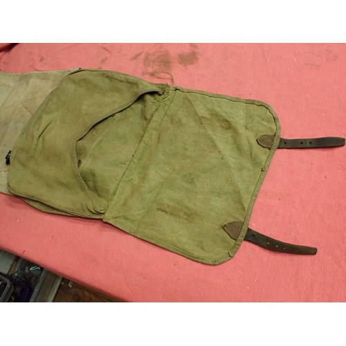318 - WW2 German breech cover? and a canvas pack

What appears to be a breech cover, possibly for an anti-... 