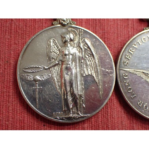 320 - Medal pair, R.A.F. G.S.M. with Malaya clasp, + L.S.G.C.

Had an area of glue to reverse of long cond... 