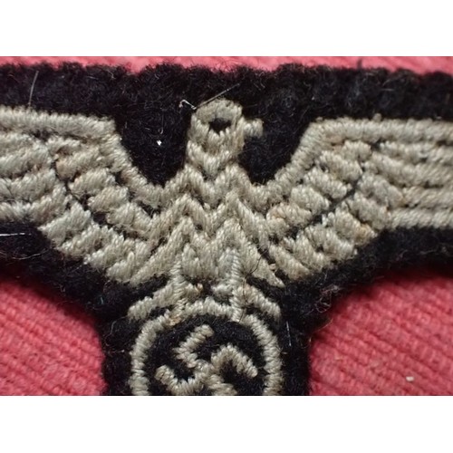 2 - WW2 German Waffen-SS side cap eagle

A nice-looking cap removed eagle. Slight wear. 57 mm across.