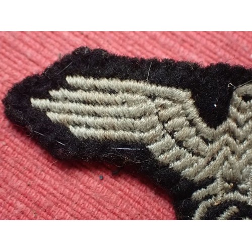 2 - WW2 German Waffen-SS side cap eagle

A nice-looking cap removed eagle. Slight wear. 57 mm across.