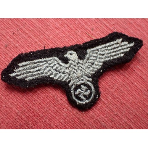 2 - WW2 German Waffen-SS side cap eagle

A nice-looking cap removed eagle. Slight wear. 57 mm across.