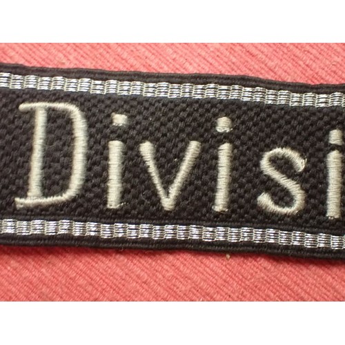 5 - WW2 Waffen-SS-Polizei Division cuff title

455 mm long with folded and stitched ends. Good clean con... 