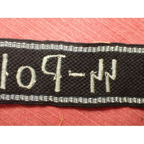 5 - WW2 Waffen-SS-Polizei Division cuff title

455 mm long with folded and stitched ends. Good clean con... 