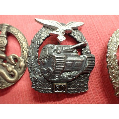 24 - Three post-war German Panzer/anti-Partisan badges

Reenactment of display gap fillers. Good quality ... 