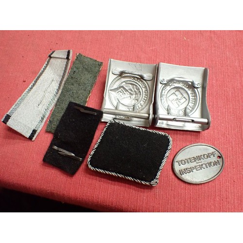 27 - Selection of post war German badges and buckles

Seven reenactment items. The HJ buckle in silvered ... 