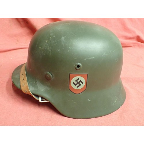 33 - German display / reenactment Waffen-SS M40 helmet

Well done display helmet. The lining appears to b... 