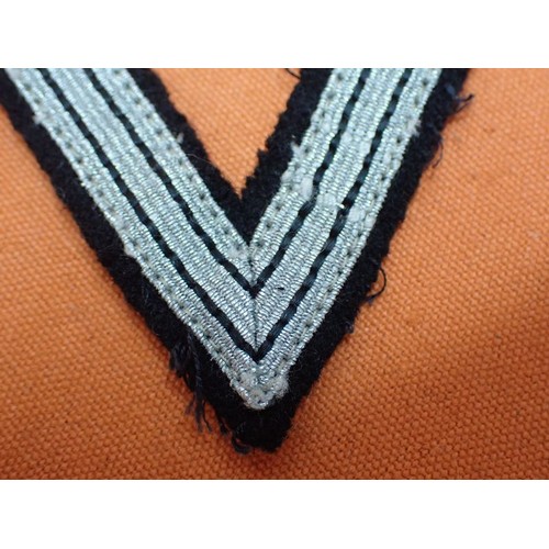 2 - WW2 German Waffen-SS NCO sleeve rank chevron

Tunic removed aluminium wire faced chevron.