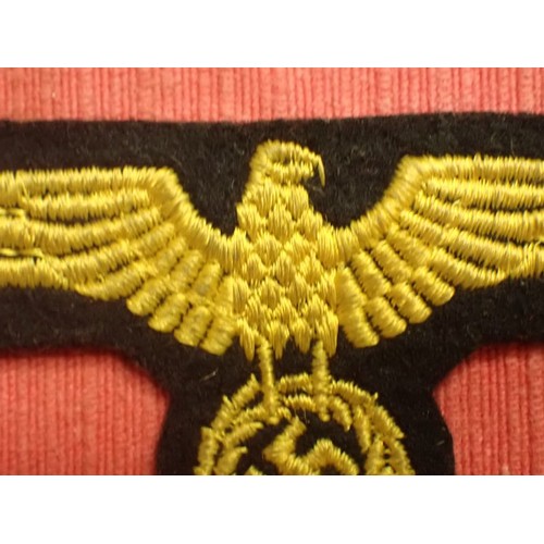 18 - WW2 German Kriegsmarine breast eagle

Small area missing to the wool at the bottom, probably from tu... 