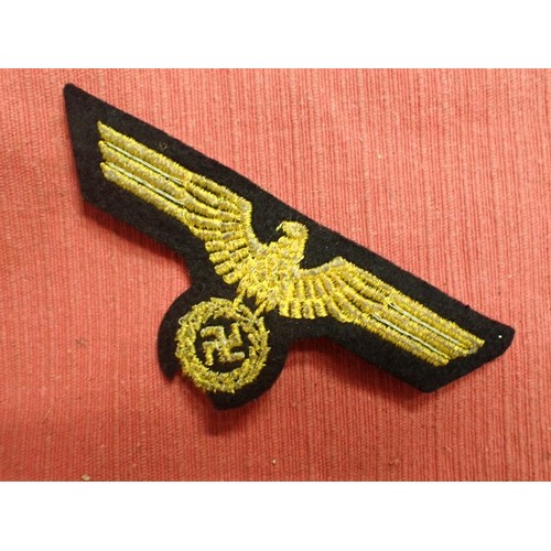 18 - WW2 German Kriegsmarine breast eagle

Small area missing to the wool at the bottom, probably from tu... 