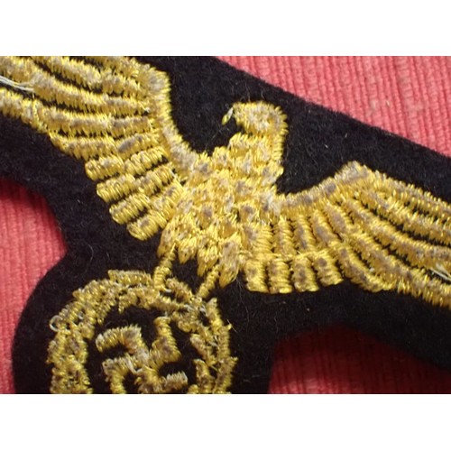 18 - WW2 German Kriegsmarine breast eagle

Small area missing to the wool at the bottom, probably from tu... 