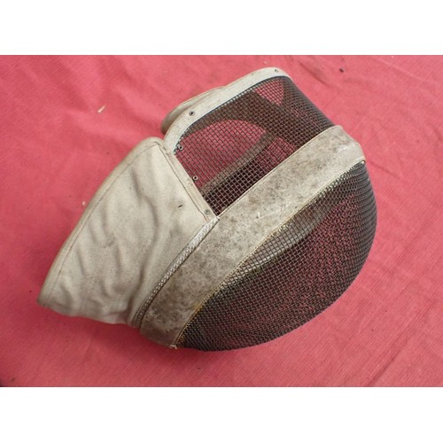 23 - Vintage fencing / sword fighting protective helmet

Rigid iron mesh face covering. London retailer l... 