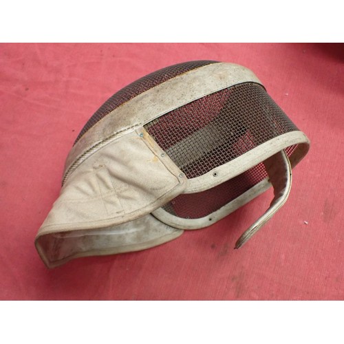 23 - Vintage fencing / sword fighting protective helmet

Rigid iron mesh face covering. London retailer l... 
