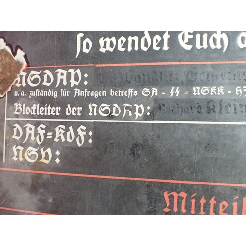 44 - WW2 German, large enamel NSDAP sign

WW2 German N.S.D.A.P Enamel Public Announcement Sign. Ground fi... 