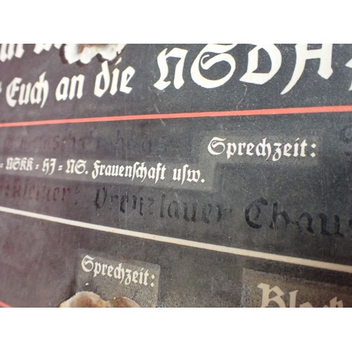 44 - WW2 German, large enamel NSDAP sign

WW2 German N.S.D.A.P Enamel Public Announcement Sign. Ground fi... 