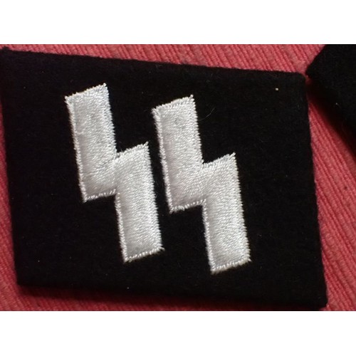 48 - WW2 German, pair of Waffen-SS runic collar tabs

Excellent condition, clean pair. No moth nips. Runi... 