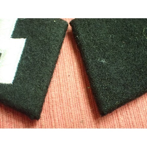 48 - WW2 German, pair of Waffen-SS runic collar tabs

Excellent condition, clean pair. No moth nips. Runi... 