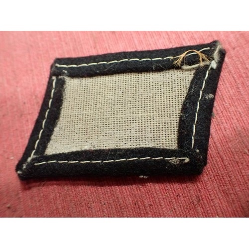 50 - 3rd Reich SS-VT Germania collar tab

Slight darkening to the white thread and light wear. 81 mm acro... 