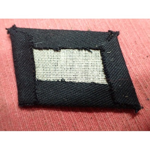 51 - 3rd Reich SS plain side collar tab

76 mm across. Shows wear to the corners.