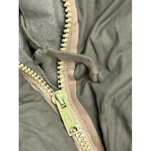 52 - 1970's American US Army Sleeping Bag

Good condition - no damage but the zip temperamental - was ful... 