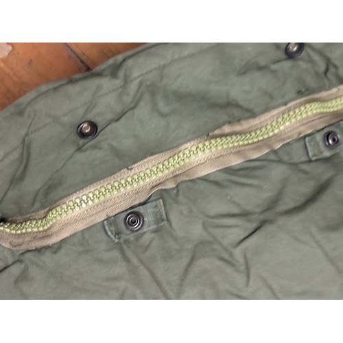 52 - 1970's American US Army Sleeping Bag

Good condition - no damage but the zip temperamental - was ful... 