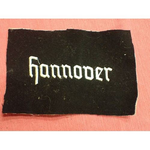 54 - 3rd Reich NSDAP drape unit marker for Hannover

Removed from the top left corner of an NSADAP unit d... 