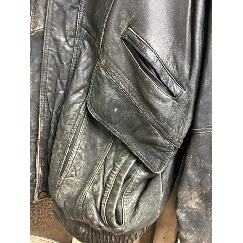 57 - Vintage Mens Leather Jacket

Some dirt from storage in theatrical company - main zip appears to work... 
