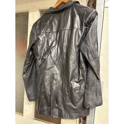 58 - Vintage Black Leather Coat

Has dirt from long term storage but appears major damage free - around s... 