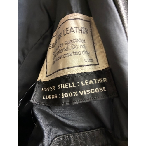 58 - Vintage Black Leather Coat

Has dirt from long term storage but appears major damage free - around s... 