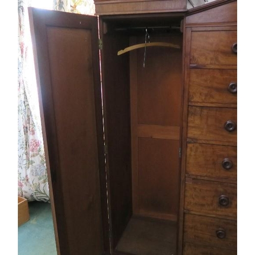 104 - A 19th century mahogany sentry box wardrobe, fitted with five long drawers over one deep long drawer... 