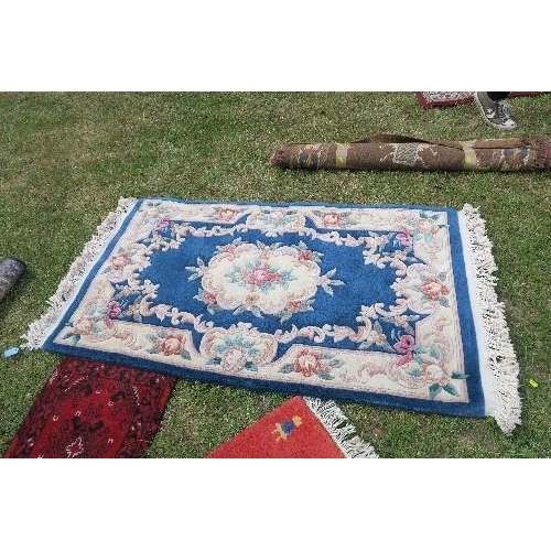 118 - TWO SMALL RED GROUND RUGS, 39INS X 18INS AND 19.5INS X 24INS, TOGETHER WITH ANOTHER RUG, 37INS X 24I... 