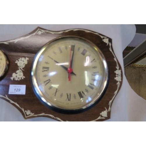 129 - A REPRODUCTION BAROMETER, HAVING A CLOCK FACE, HEIGHT 33INS X MAXIMUM WIDTH 10INS