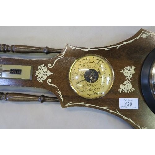 129 - A REPRODUCTION BAROMETER, HAVING A CLOCK FACE, HEIGHT 33INS X MAXIMUM WIDTH 10INS