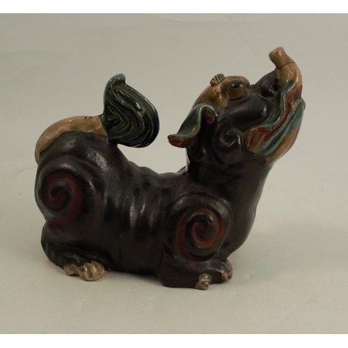 143A - A stoneware model, of a dog of fo, length 8ins, height 7ins, af