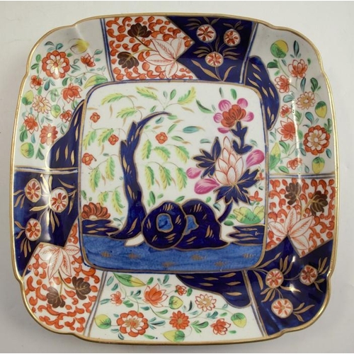 148 - A 19th century Coalport part service, decorated in the Tree of Life pattern in Imari colours, twelve... 