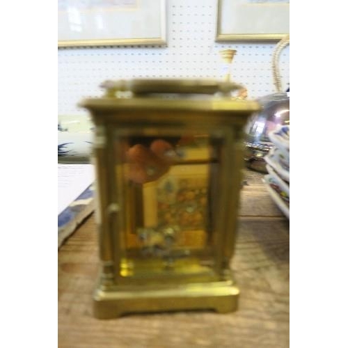 149 - A GILT BRASS CARRIAGE CLOCK, HEIGHT 4.75INS X WIDTH 3INS