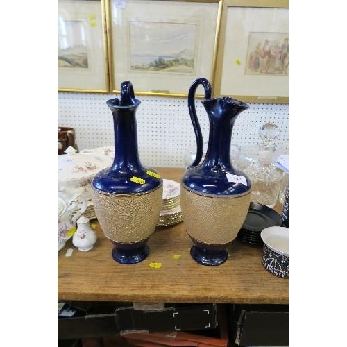 160 - A PAIR OF ROYAL DOULTON EWERS, STAMPED TO THE BASE, HEIGHT 14INS