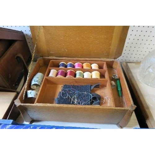 183 - A SEWING BOX AND CONTENTS