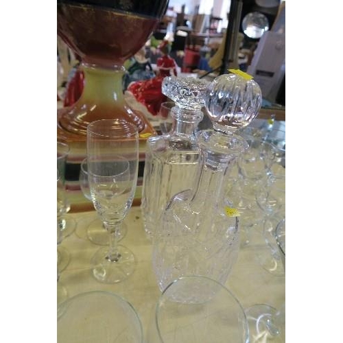 195 - A SUITE OF ASSORTED GLASS, INCLUDING SHERRY GLASSES, WINE GLASSES, TUMBLERS AND TWO DECANTERS