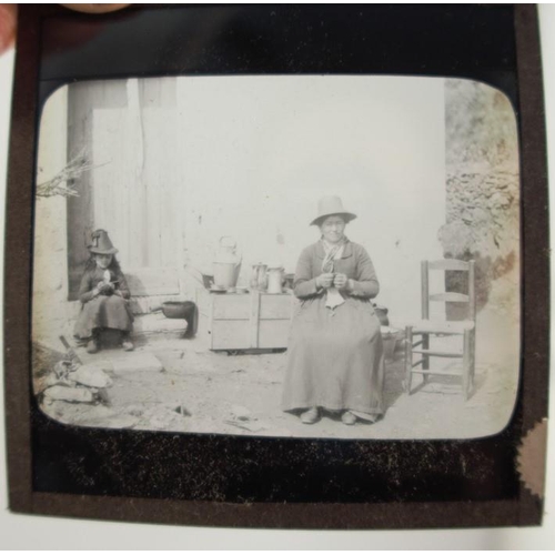 227 - Two boxes of various lantern and glass slides, the one box containing pictorial views, the other wit... 