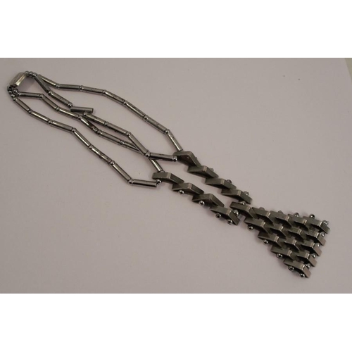 253 - An Art Deco metal necklace, in the style of Jakob Bengel, 37.5cm long