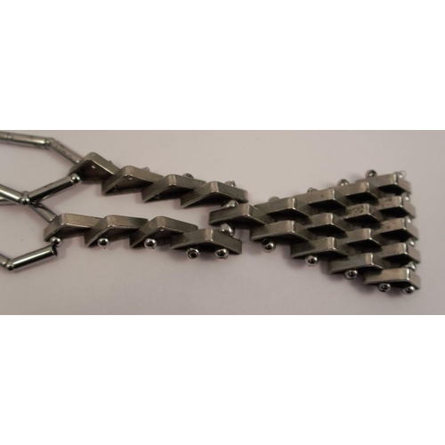 253 - An Art Deco metal necklace, in the style of Jakob Bengel, 37.5cm long