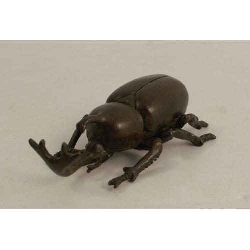 254 - A modern Japanese style bronze model, of a beetle, signed, length 2.75ins