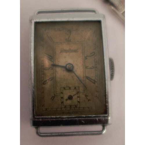 256 - A silver fob watch, with bar movement, cylinder escapement, together with a Sagendorf wrist watch, a... 