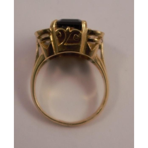 264 - A smoky quartz white stone dress ring, in unmarked yellow gold, tests as 18 carat gold, finger size ... 