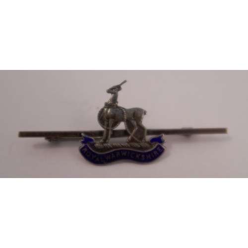 277 - A Royal Warwickshire Regiment sweetheart bar brooch, stamped 'Silver', approximately 5.6cm long, tog... 