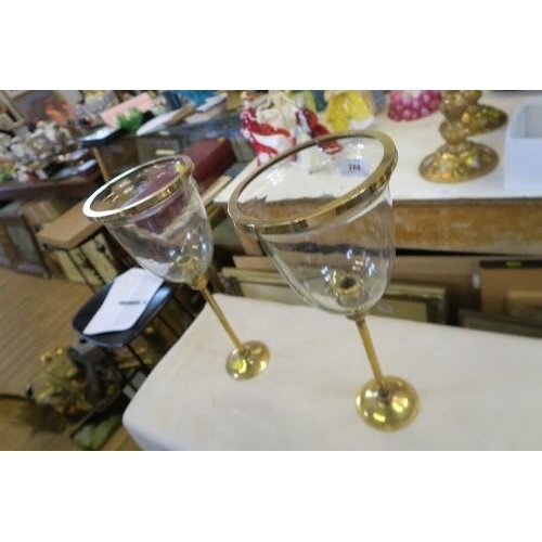 288 - A PAIR OF BRASS AND GLASS CANDLE STANDS, OF GOBLET FORM, HEIGHT 16INS X DIAMETER 6.25INS