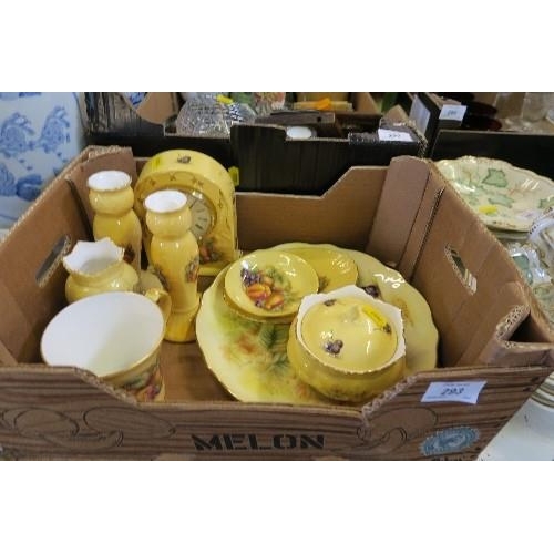 293 - A BOX OF AYNSLEY ORCHARD GOLD CHINA, TO INCLUDE CLOCK, CANDLE STICKS, ETC.