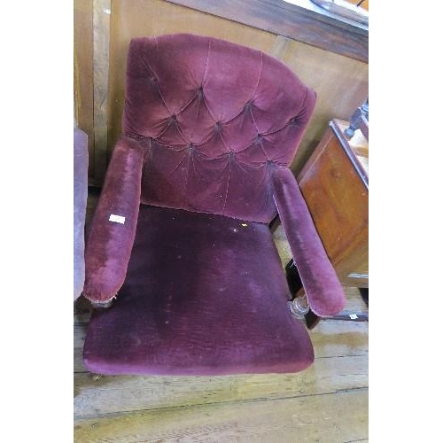 34 - A DEEP BUTTON BACK OPEN ARMCHAIR